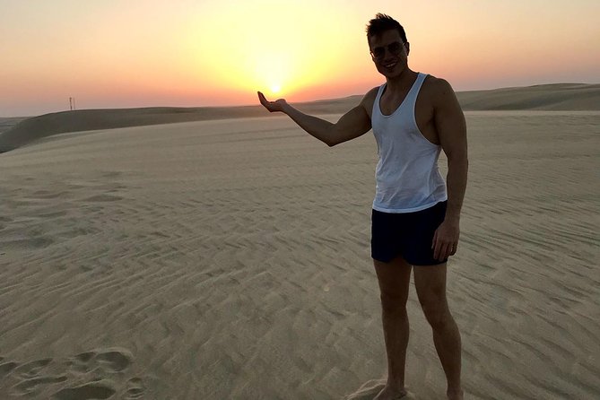4 Hour Desert Safari, Camel Ride & Inland Sea Beach - Camel ride and falcon photo ops: fun, but go in with the right expectations