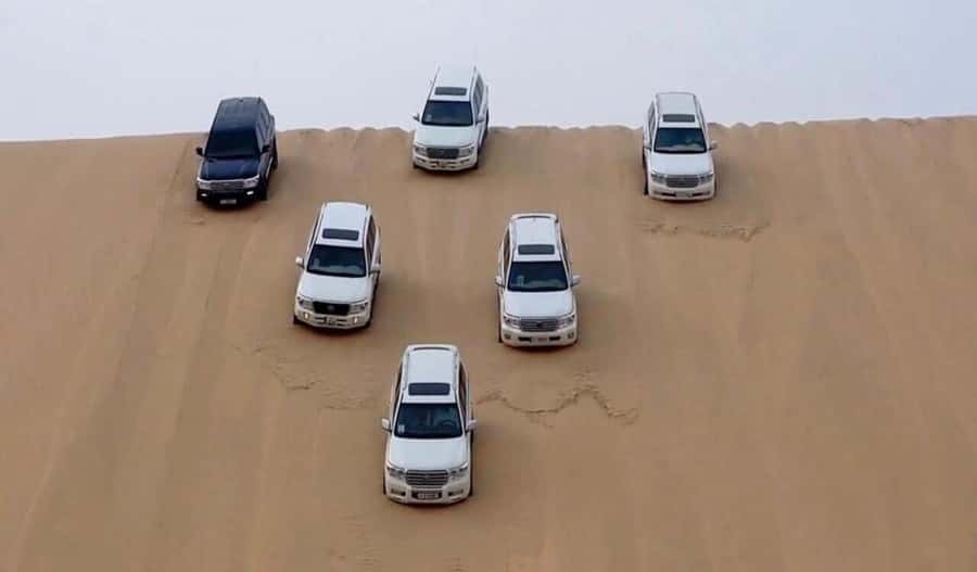 Desert Safari, Dunes Ride, Sand Boarding & Inland Sea Tour - Meeting at National Museum Metro, then settling in