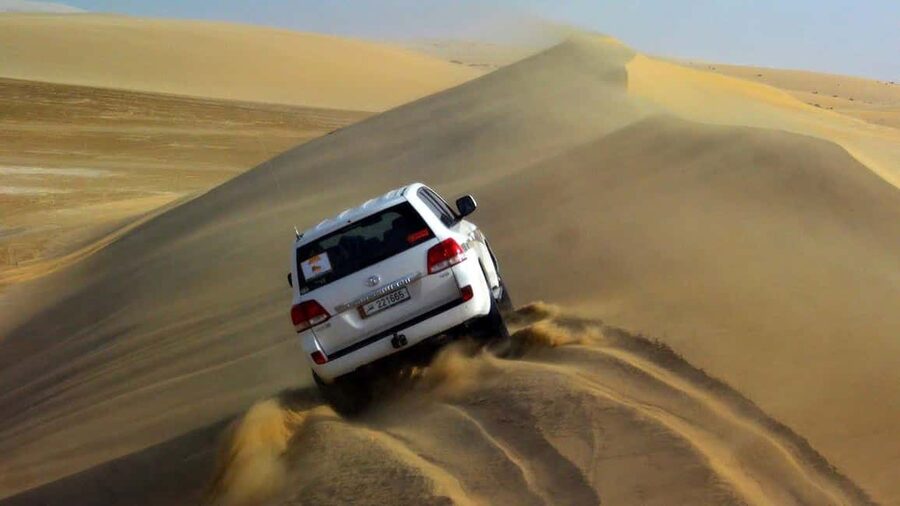 Desert Safari, QuadBike,Dune buggy, Sandboarding & CamelRide - Sheraton Dune, dune bashing, and sandboarding in the same sweep