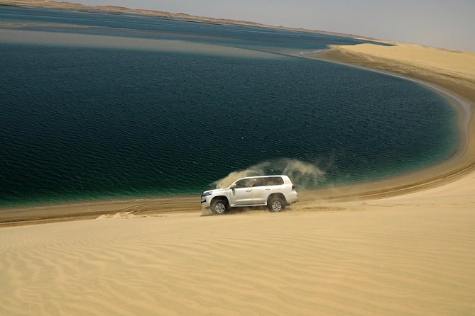 Desert Safari with Camel Ride, Sand Boarding & Inland Sea Tour in Doha - Key highlights that make this safari worth your time