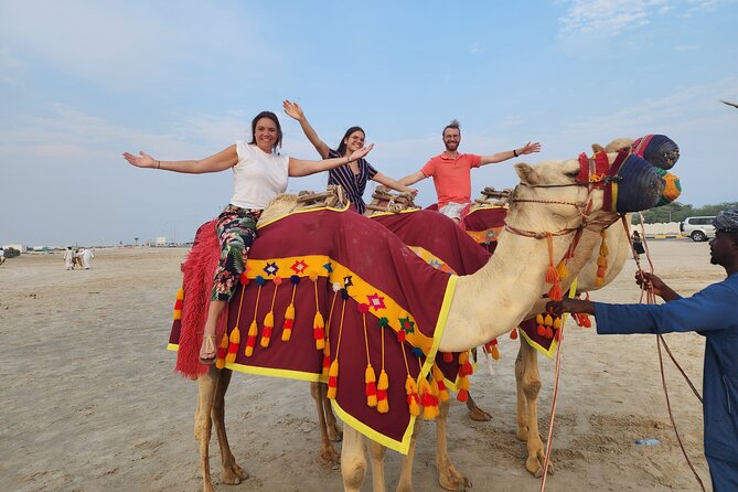 Desert Safari with Sandboarding and Inland Sea Private Tour - Guides and drivers: safety, humor, and photo help you can feel
