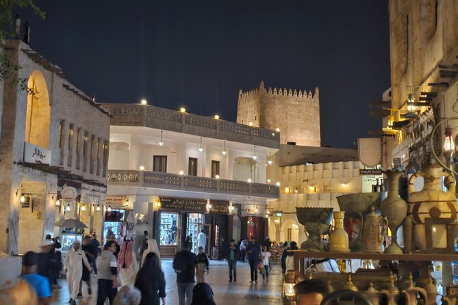 Doha All Inclusive Night City Tour with Traditional Dhow Boat - Pearl-Qatar and the Old Port contrast
