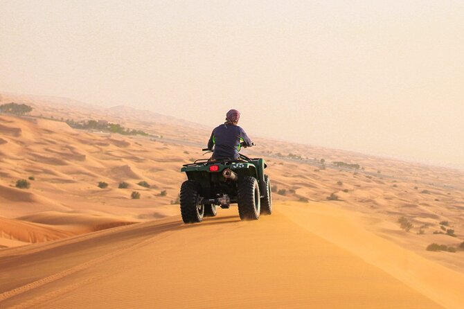 Doha ATV Quad Bike Adventure in the Middle of Desert Qatar - After the dunes: Sealine Beach tire deflation and optional camel time