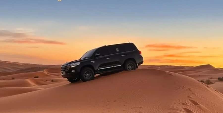 Doha: ATV Quad Bike and Buggy Desert Safari with Camel Ride - 4WD Toyota dune bashing: when the desert really shows off