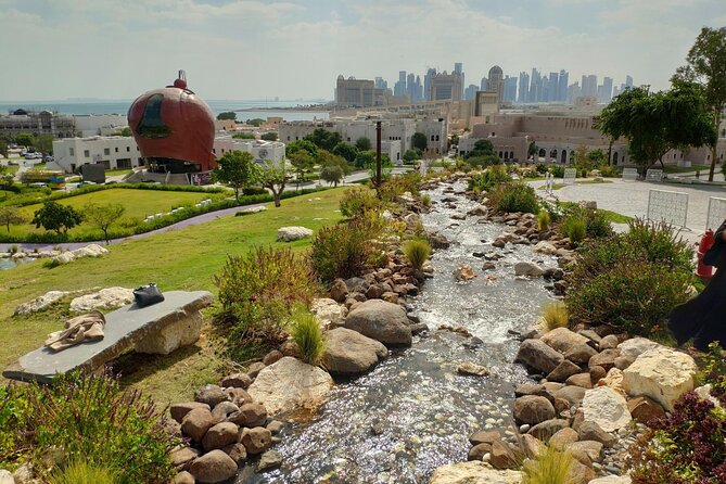 Doha City Tour: Guided Tour to Souq Waqif, Katara, Pearl Island - Pearl Island: freehold waterfront views tied to Qatar’s pearl past