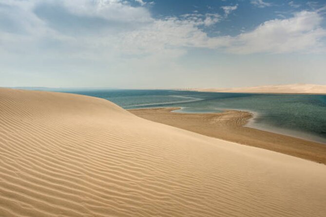 Doha Desert Quad Bike adventure with group, and Sand dune Driving - Sand Boarding Slides and the $10 Camel Ride Option