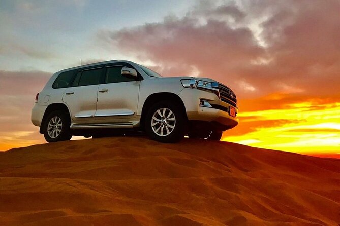 Doha Desert Safari Quad Bike Buggy Camel Ride and Inland Sea Tour - Camel ride at Sealine, plus tyre-deflation photo moments