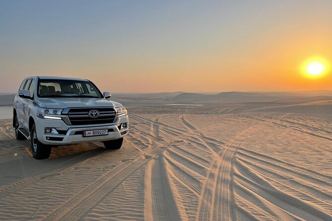 Doha: Desert Safari, Sand Boarding, Camel Ride & Inland Sea Tour - Khor Al Udaid Inland Sea Stop: Qatar’s Desert Meets Water