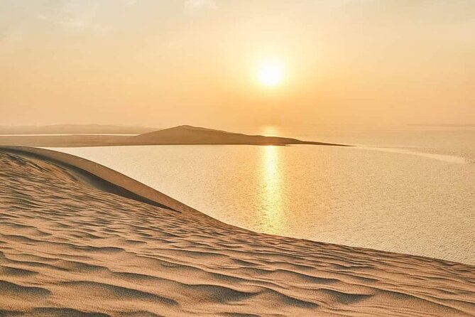 "Doha Desert : Safari, Sandboarding, Camel Ride & Inland Sea" - Inland Sea (Khor Al Adaid) Stop: Desert Meets Water