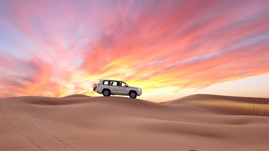 Doha: Desert Safari, Sandboarding, Dune Bashing & Inland Sea - The drive to Mesaieed: get ready for sand and a real camp moment