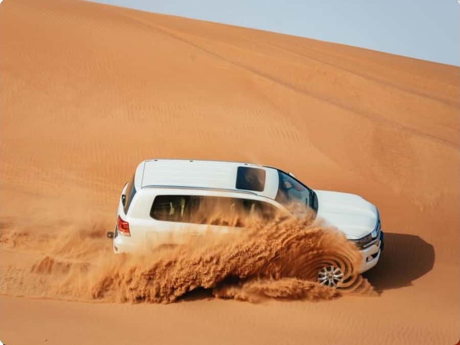 Doha:Desert Safari with Camel Ride, ATV Bike,& Sand Boarding - Pickup in Doha, and why timing matters