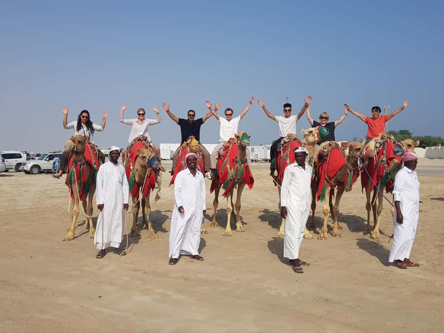 Doha: Desert Safari with Camel Ride Family Friendly Tour - Inland Sea and the Saudi border viewpoint: sunset is the main act