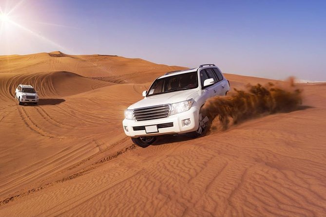 Doha: Desert Safari With Quad bike ,Camel Ride And Sand Boarding - Sealine Beach Stop: Tea, Toilet Access, and Extra Time