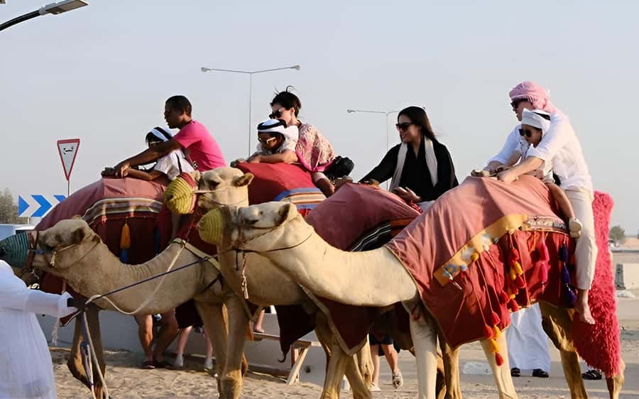 Doha: Desert Safari with Quad Bike, Sandboard & Camel Ride - Getting There in Doha: Hotel Pickup vs Qatar National Museum Metro