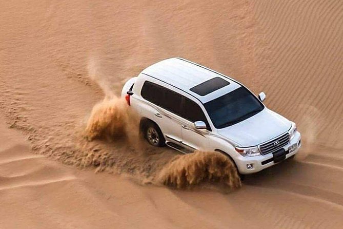 Doha :Half Day Desert Safari | Camel Riding | ATV | Sand Surfing - Stop 1 in Doha: where the tour begins and why timing matters