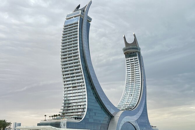 Doha Highlights Guided Tour With Dhow Cruise - The Pearl Island: luxury reclaimed-land views in a short stop