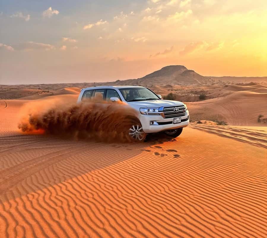 Doha: Inland Sea Desert Safari with Sunset & Sunrise Views - Dune bashing and sandboarding: fun with real physical movement