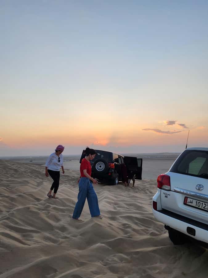 Doha: inland sea Tour With Dune Bashing &Sandboarding fun - Sandboarding: the thrill is real, but the setup is friendly