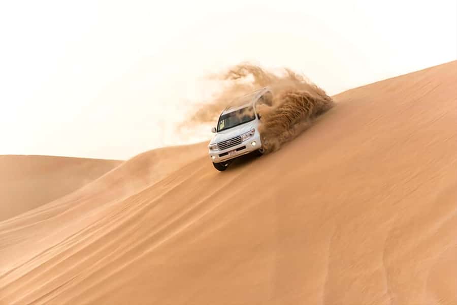 Doha: inland sea Tour With Dune Bashing &Sandboarding fun - Sunset and photo stops that help your photos land better