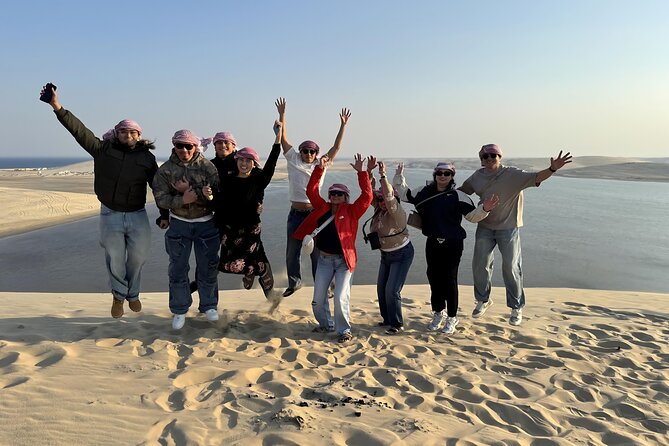 Doha: Luxury Desert Safari, Quad Bike & Sandboarding - Sealine Beach Camel Area: tea, camels, and a human pace