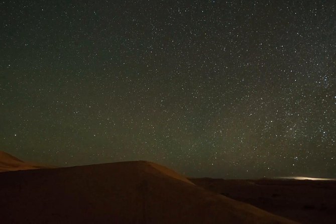 Doha Night Desert Safari Camel Ride Dune Bashing with Transfer - Sealine Beach camel camp stop: short camel ride, big star payoff