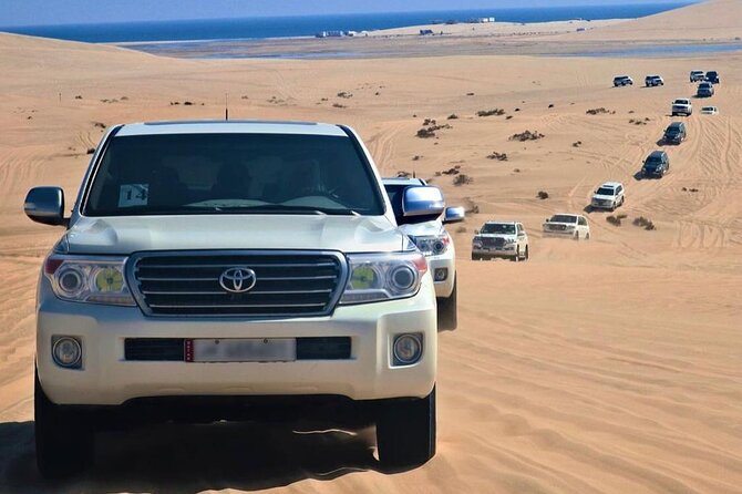 Doha: Private Half Day Desert Safari Tour in Qatar - Sealine Beach: Dune Panoramas, Sunset Photos, and Sandboarding