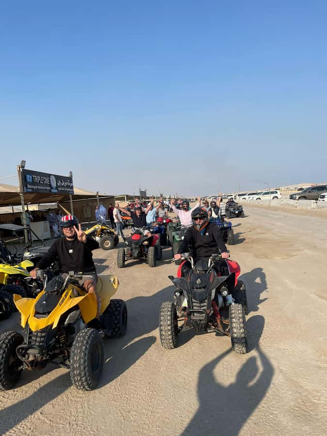 Doha: Quad Bike, Desert Safari, Buggy ride & inland sea tour - Camel ride and falcon pictures, short and sweet