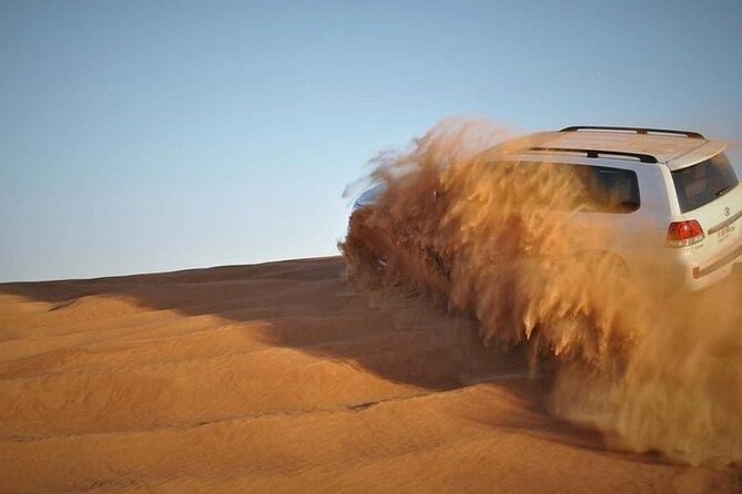Doha: Quad Bike, Dune Bashing, Camel Ride & Inland Sea Tour - Leaving Doha fast, then getting to the sand