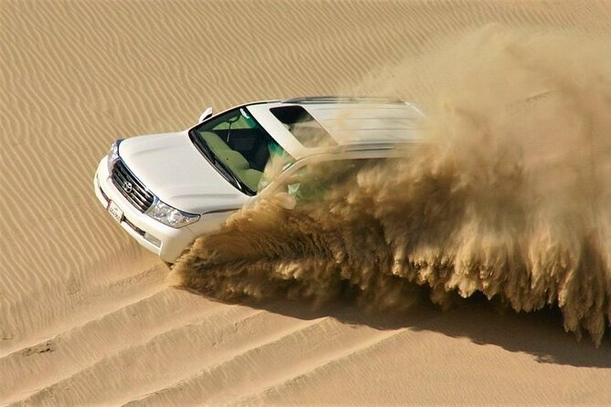Doha: Quad Bike, Dune Bashing, Camel Ride & Inland Sea Tour - Quad biking on approved tracks: fun with firm boundaries