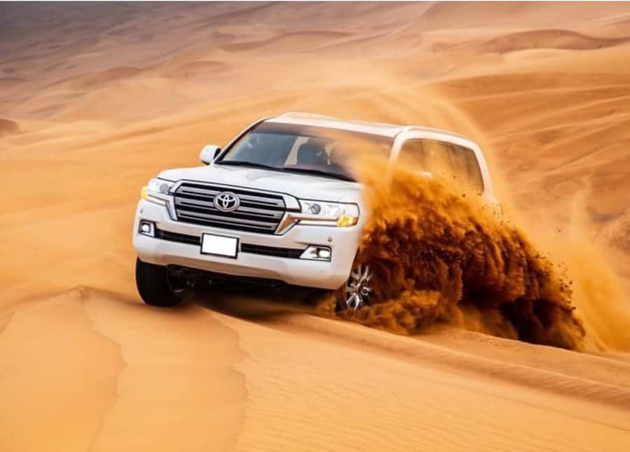 Doha: Relax Desert Safari, Camel Ride, Inland Sea, Swimming - Mesaieed stops: camel ride, walking breaks, quads, and first contact with big dunes