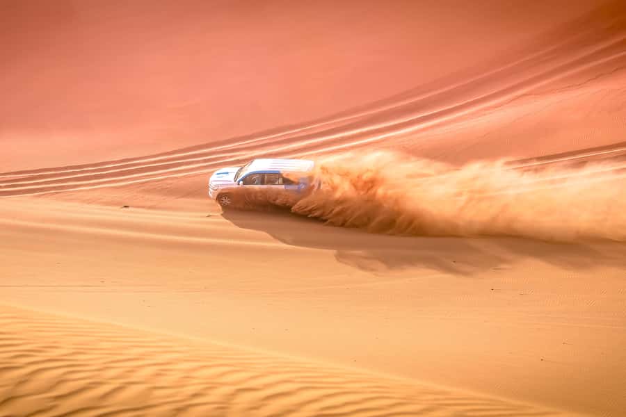 Doha: Safari, ATV, Camels, Sandboarding and Inland Sea Tour - Sealine Beach Stop: Photos First, Then Camels on Sand