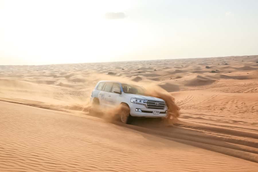 Doha: Safari, ATV, Camels, Sandboarding and Inland Sea Tour - Dune Bashing in a Qatar Desert 4WD: Where the Adrenaline Lives