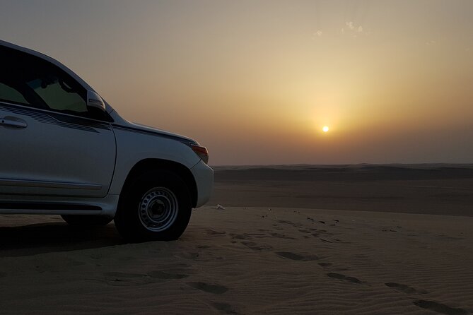 Doha: Sunrise /Sunset Desert Safari with Sand Boarding,Camel ride - Khor Al Udaid and the Inland Sea: Desert Meets Water, UNESCO Setting