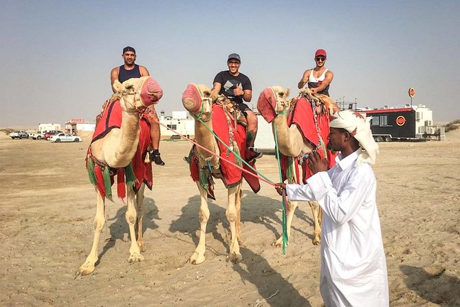 Doha: Sunset Desert Safari, Camels, Sandboarding & Inland Sea - Camel Riding: Great Photos, Short Duration, Plan for Comfort
