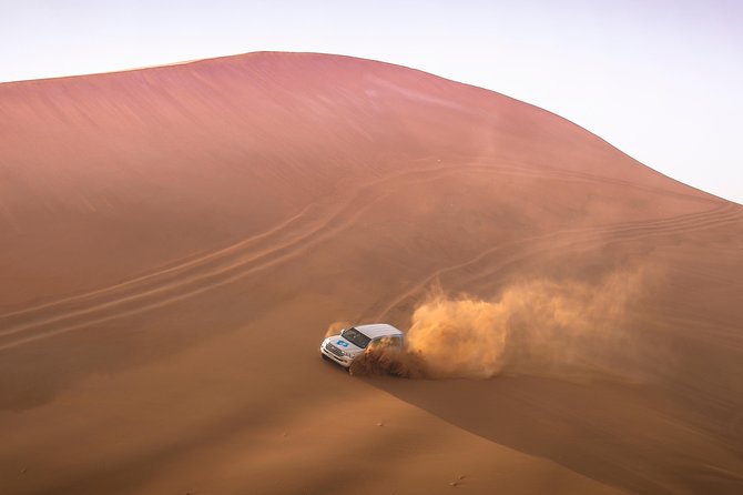 Doha: Sunset Desert Safari, Camels, Sandboarding & Inland Sea - Dune Bashing: The Rollercoaster Moment (With Real Driver Control)