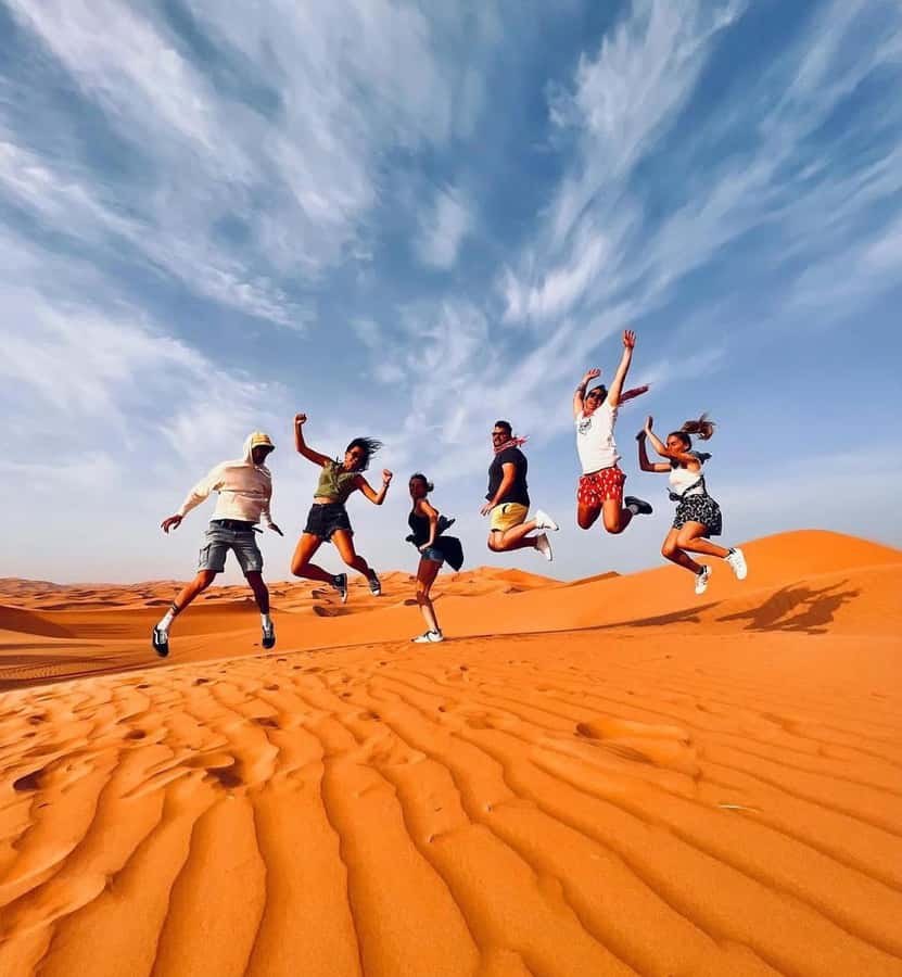 Doha: Sunset Desert Safari with Camel Ride & Sandboarding - Camel ride pause: calm, cultural context, and a quick photo window