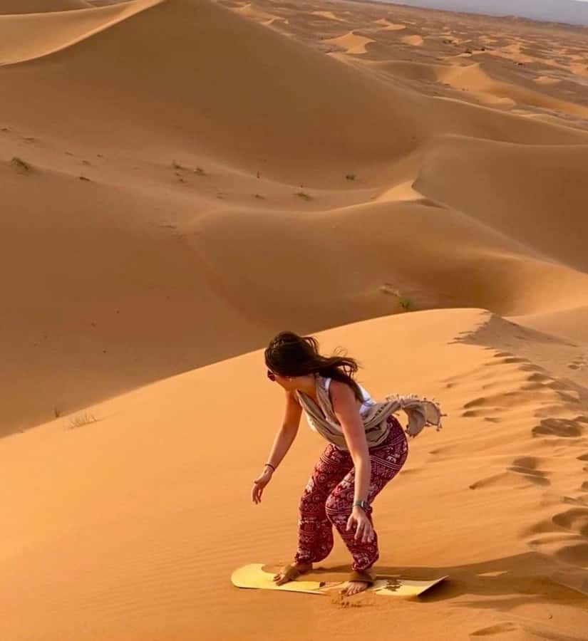 Doha: Sunset Desert Safari with Camel Ride & Sandboarding - Sandboarding on Qatar dunes: fun for first-timers