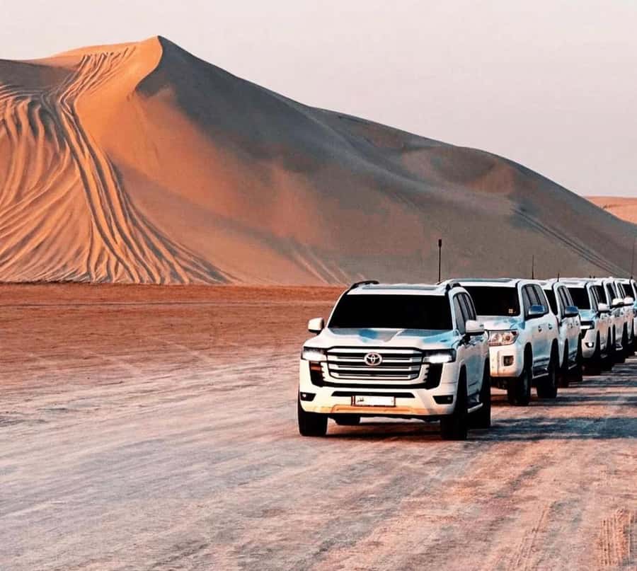 Doha: Sunset Desert Safari with Camel Ride & Sandboarding - The Inland Sea finale: where the sunset becomes the main event