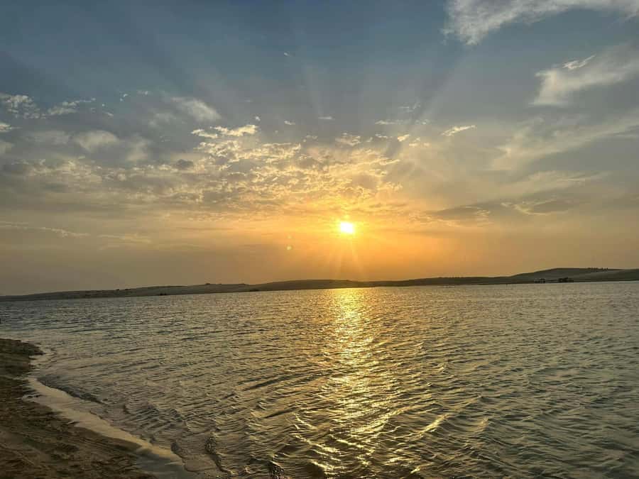Doha: Sunset desert tour with Camel Ride, Inland Sea & Tea - Camel ride at Mesaieed, plus tea in a Bedouin camp