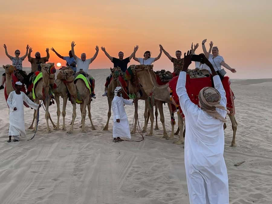 Doha: Sunset Safari, Dune Bashing, Sandboarding & Camel Ride - Camel ride at the local camp, short and satisfying