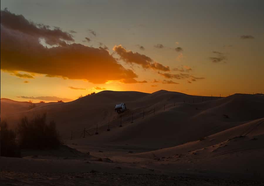 Doha: Sunset Safari, Dune Bashing, Sandboarding & Camel Ride - Group size and pacing: private or small groups