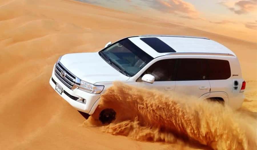 Dune Bashing &Beyond The Ultimate Desert Safari From Doha - Red Dune Bashing, Sandboarding, and the Camel Ride Option