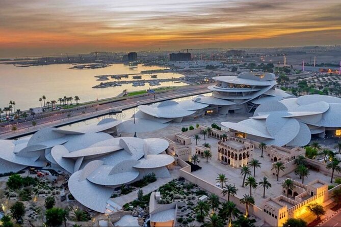 Explore Heart of Qatar Doha City Tour with Professional Guide - The Pearl-Qatar: Porto Arabia Boardwalk and a Venice-Style Cruise Experience