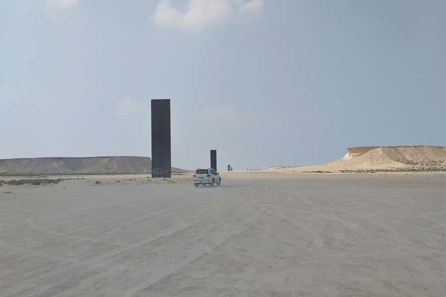 Explore Zekreet: Richard Serra Art & Mushroom Rock Wonders - Al-Shahaniya Municipality stop: a small window into place and pace