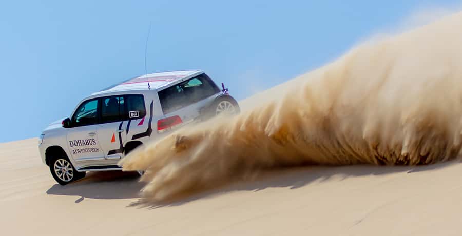 From Doha: 8-hour Safari Tour with Desert Beach Experience - Inland Sea Stop: Khor Al Adaid and That Dunes-to-Water Contrast