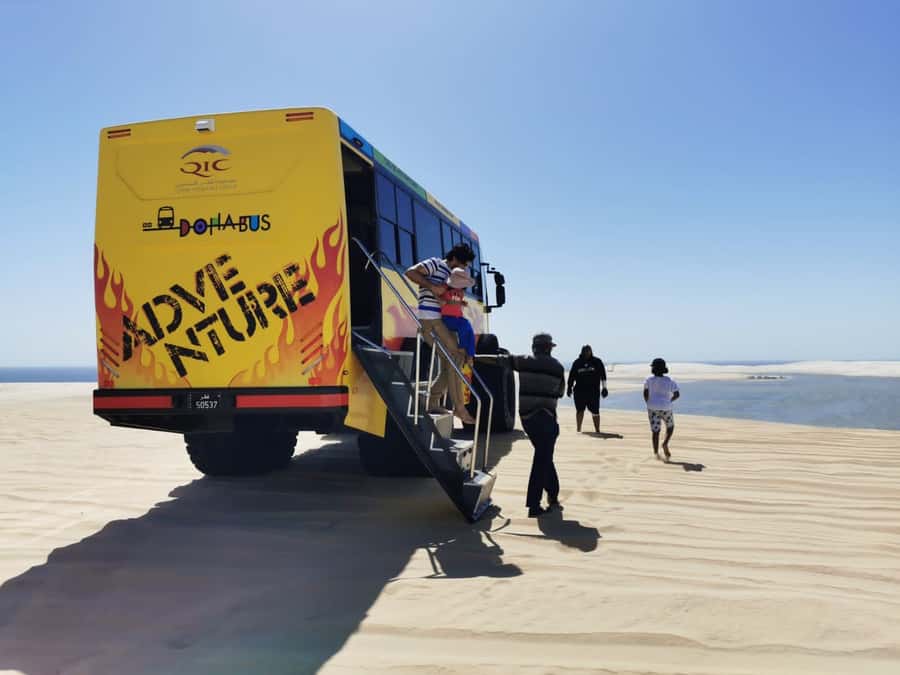 From Doha: Exclusive Monster Bus Safari Experience - Quick photo stop and scenic views on the way