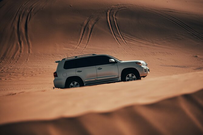 Full-Day DesertSafari with Camel Ride,InlandSea & BBQ Desert Camp - Inland Sea (Khor Al Adaid) for a Different Kind of Desert View