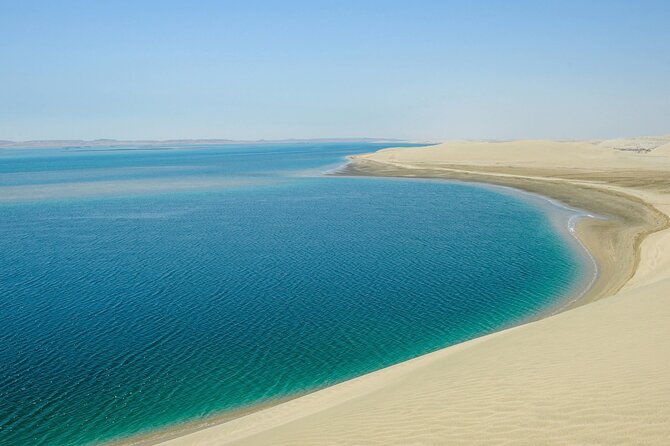 Full Day Qatar North and Desert Safari with pickup - Sealine Beach: Camels, Falcon Photos, and Local Tea