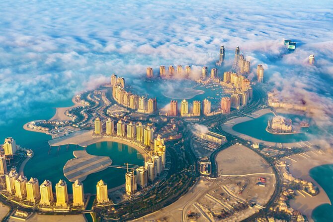 Half Day City Tour for Layover and Transit from Doha Airport - The Pearl-Qatar and Porto Arabia Boardwalk: modern Doha, comfortable pacing