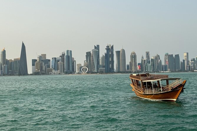 Half Day Doha City Tour And Wooden Dhow Boat Ride (Private Tour) - Katara Cultural Village: arts venues, traditional architecture, and global events
